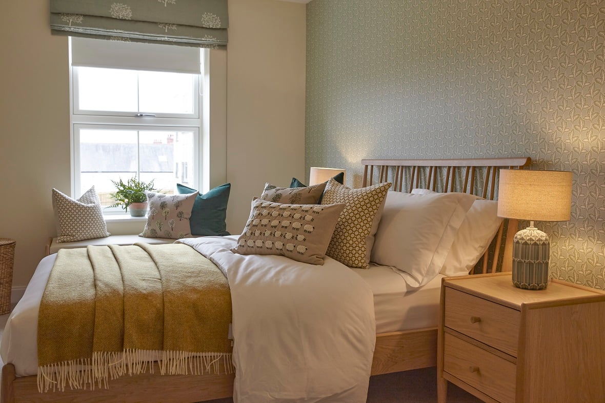 Margaret's cream-decorated second bedroom