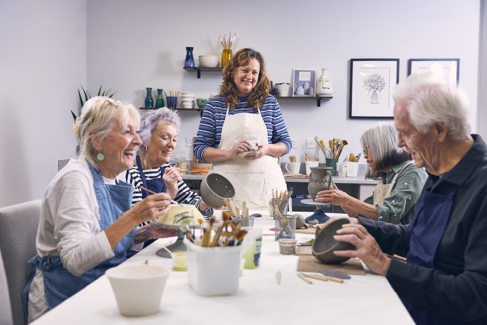 a group of women sitting around a table