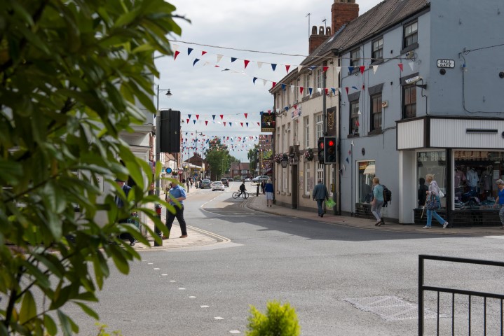 a street with people walking and walking