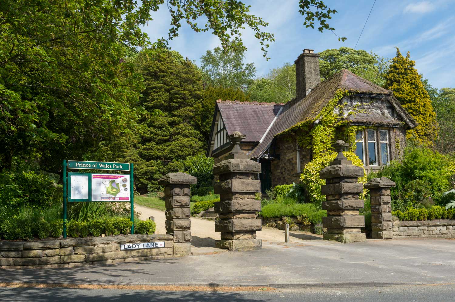 a stone building with a sign