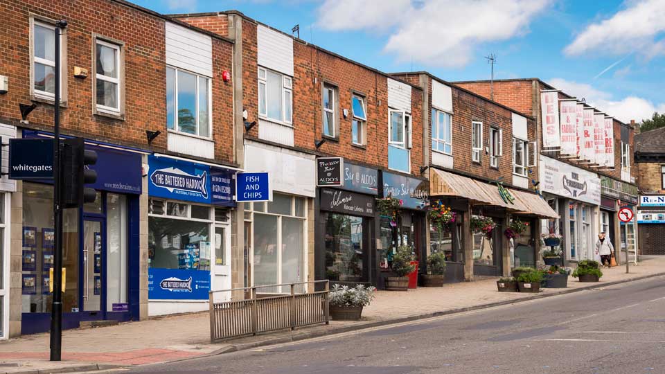 a street with stores on the side