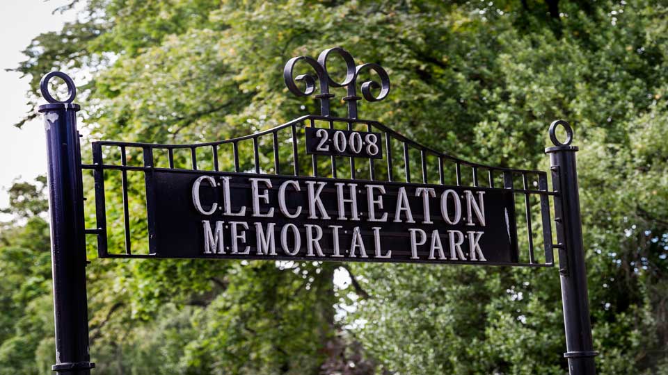 a black sign with white text