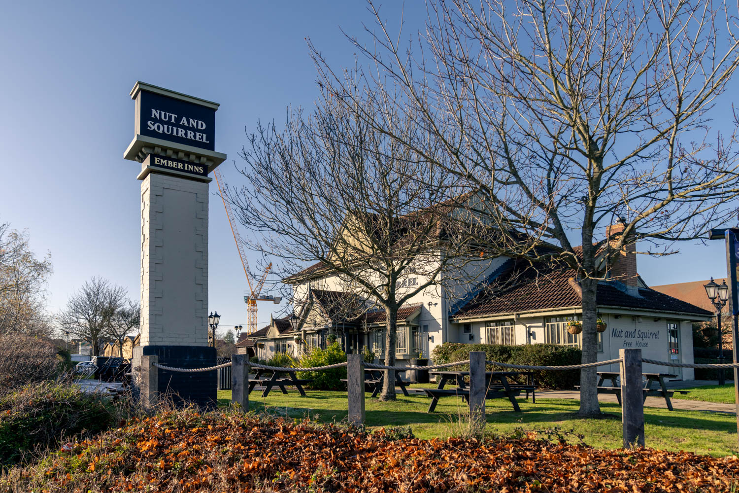 a white tower with a sign on it
