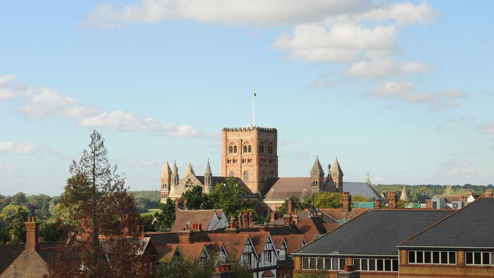 a large building with a flag on top of it