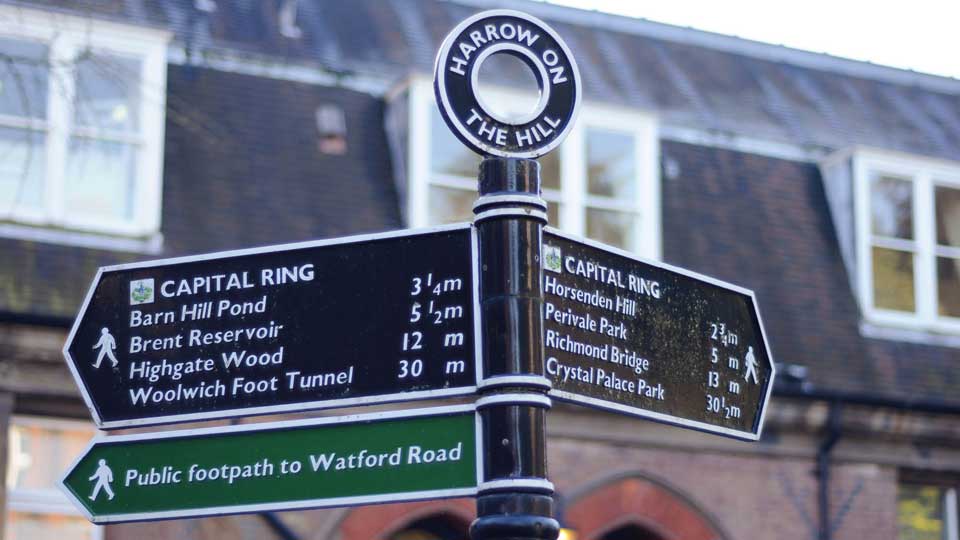 a street sign with directions