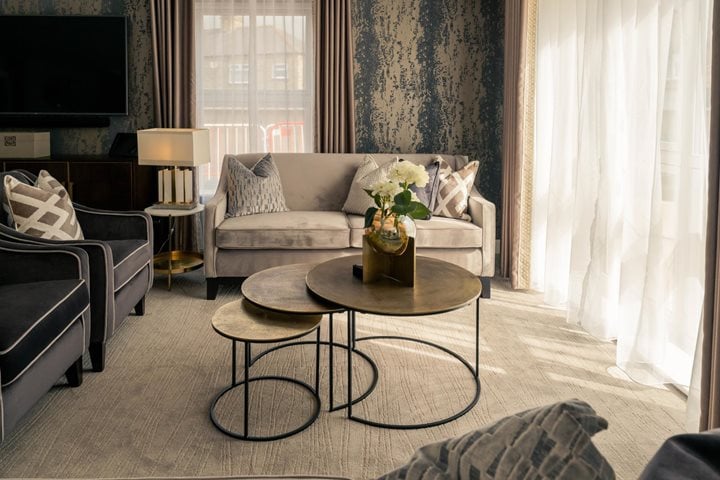 a living room with a couch and coffee table