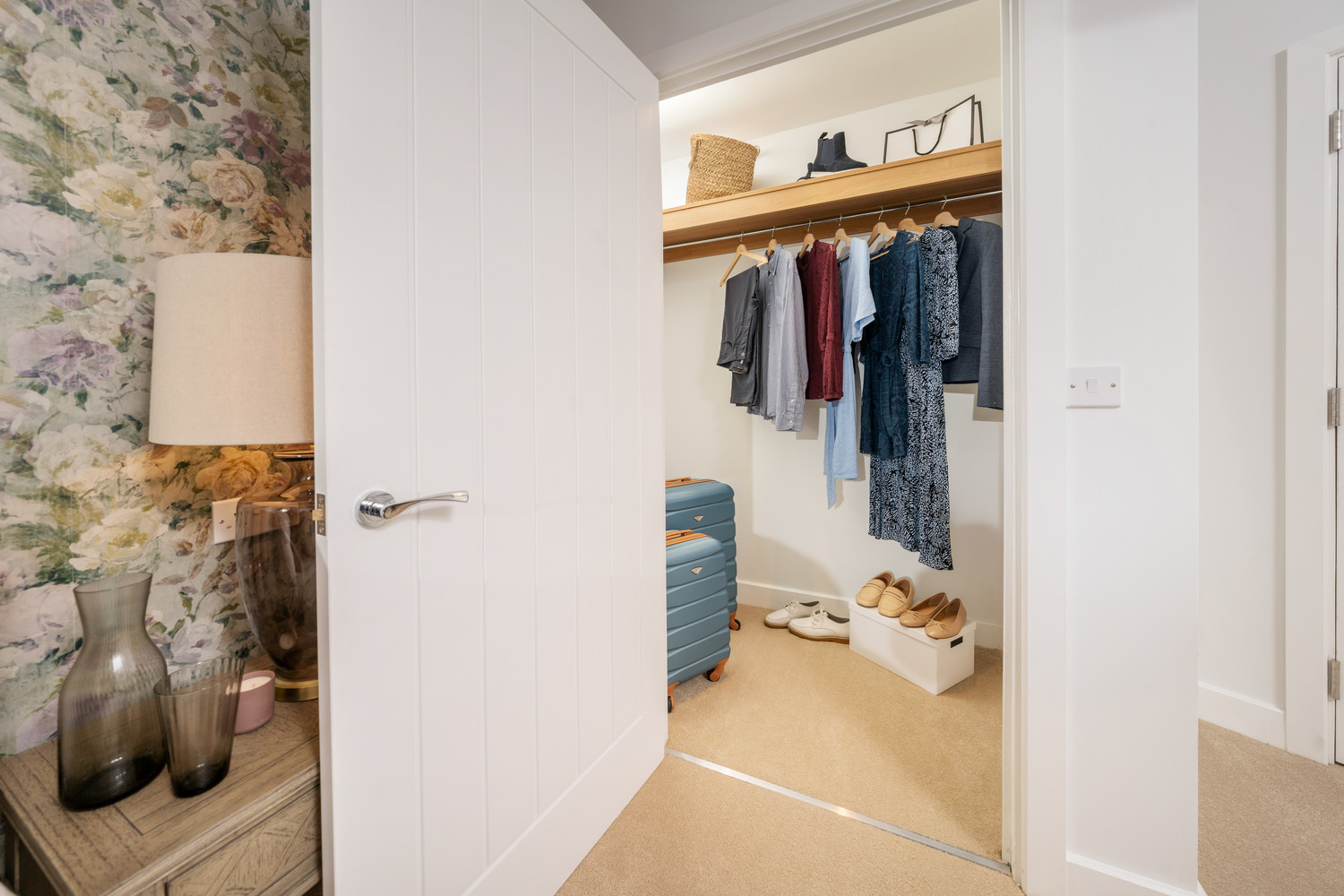 a closet with clothes
