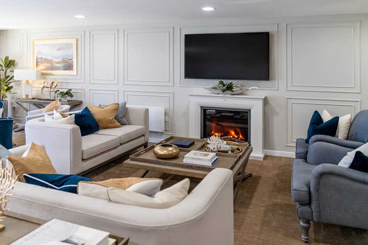 a living room with a fireplace