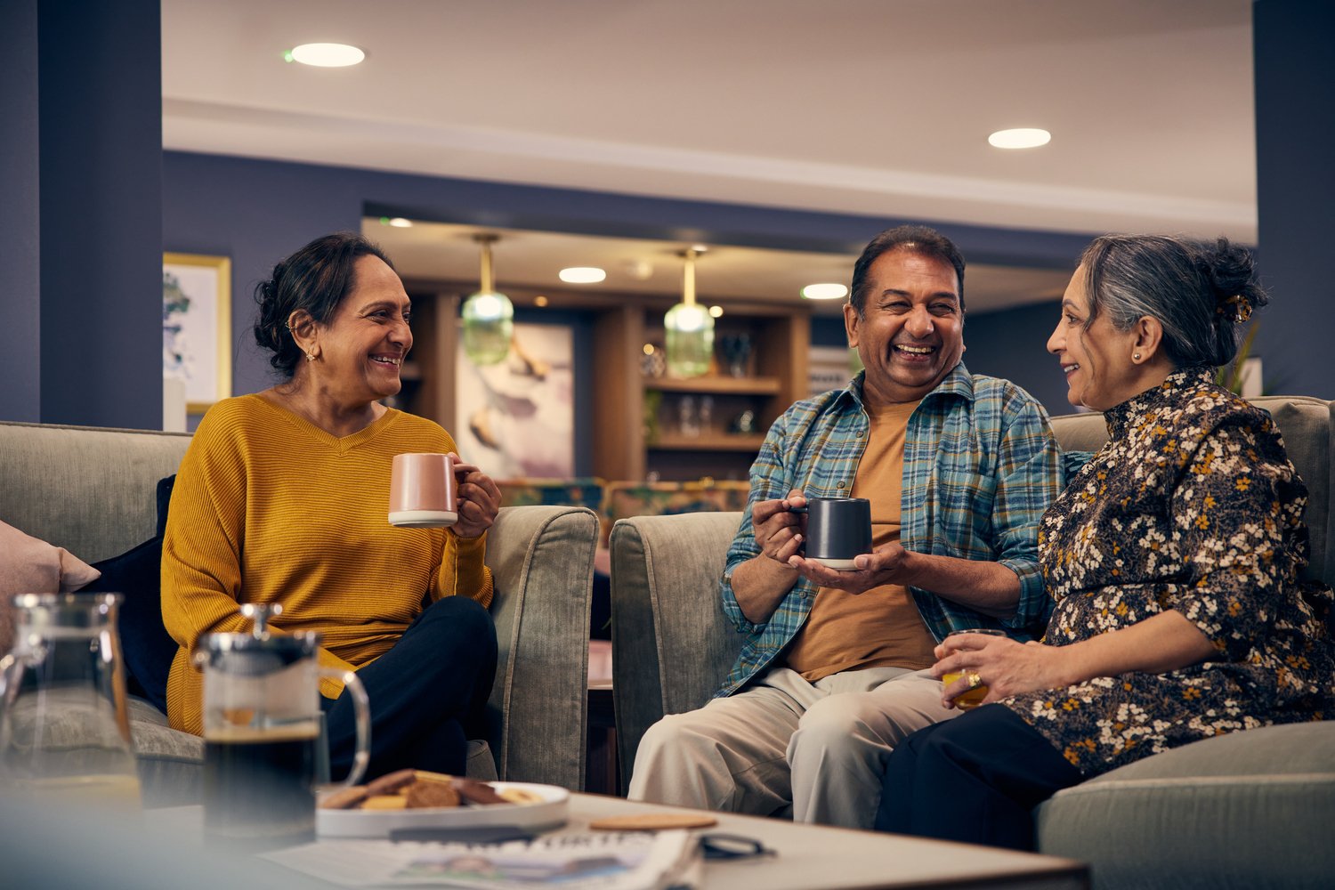 a group of people sitting at a table