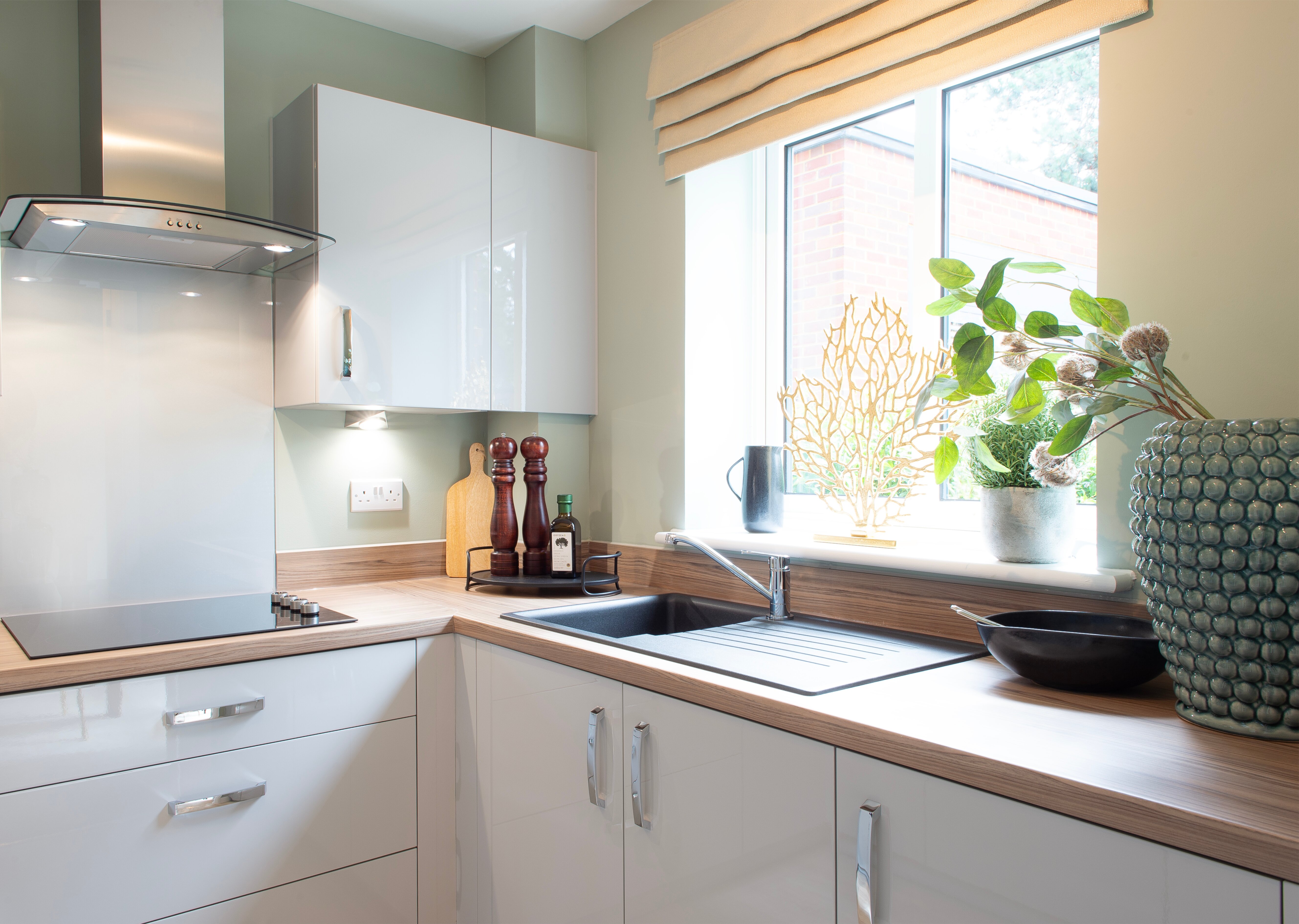 a kitchen with white cabinets