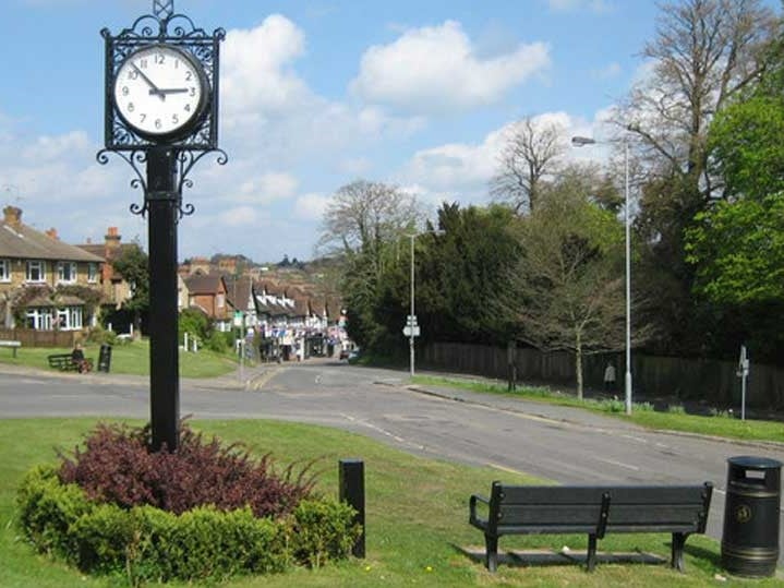a clock on a pole