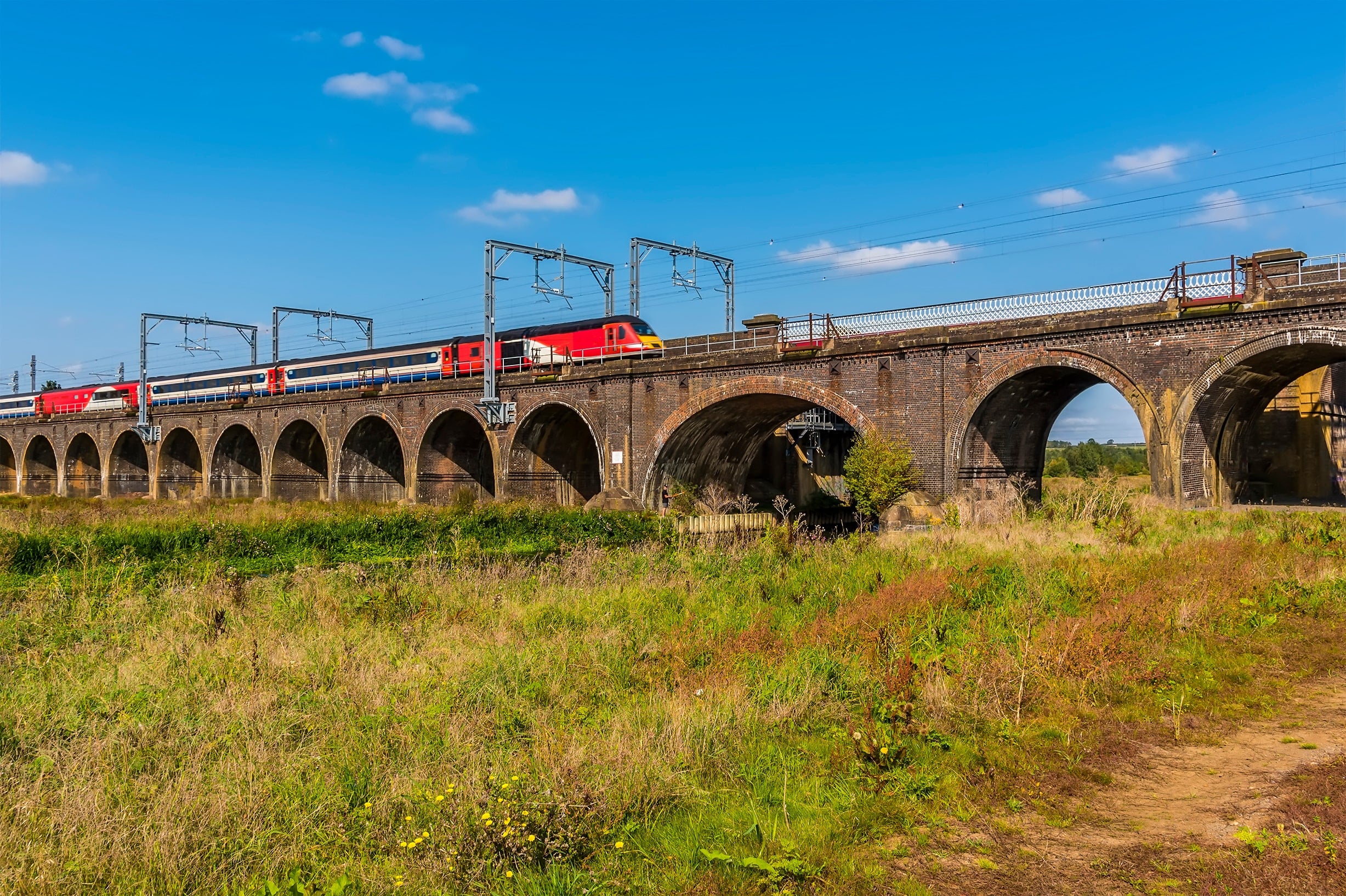 A train moving over a viaduct in Northamptonshire.