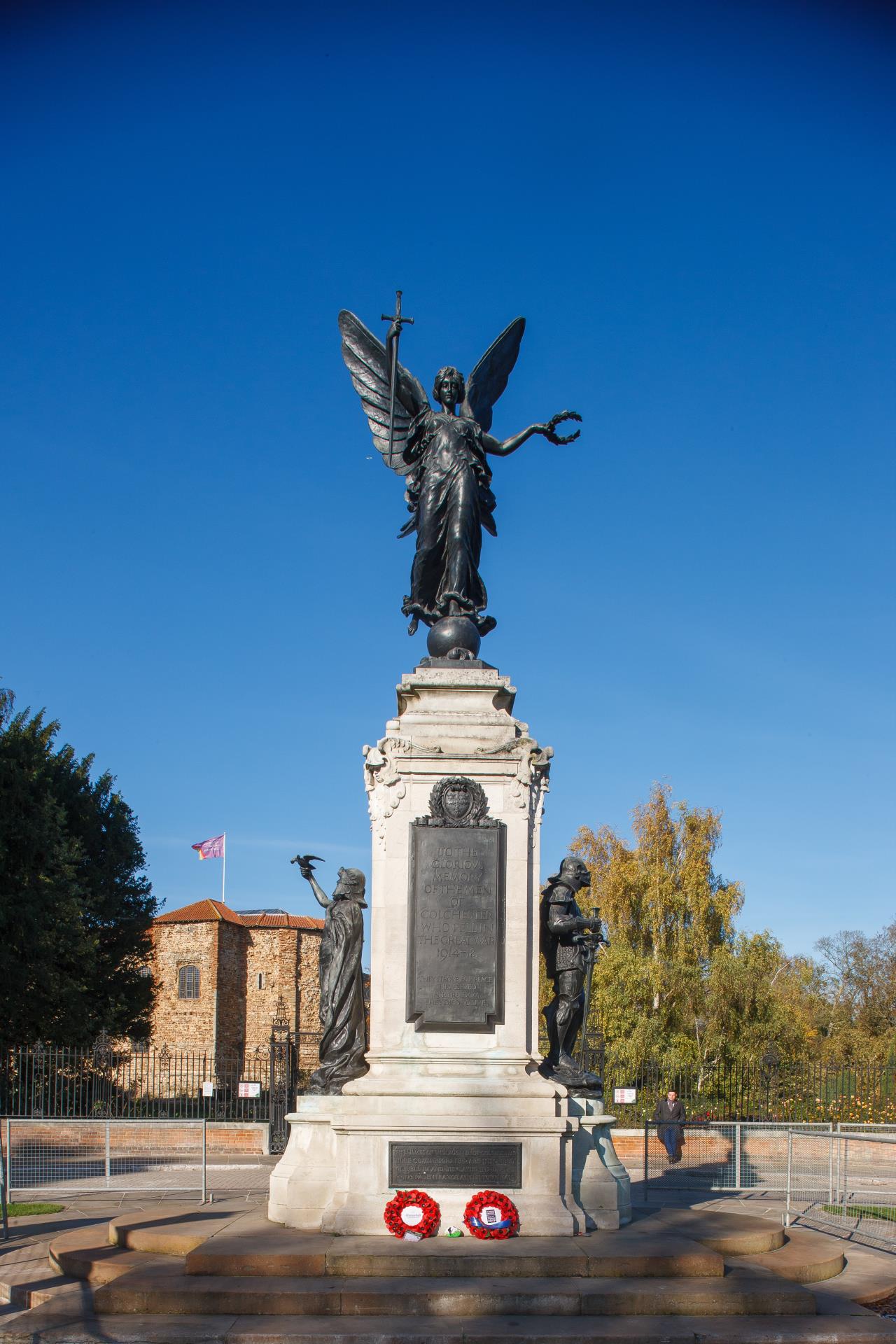 a statue of a person holding a torch