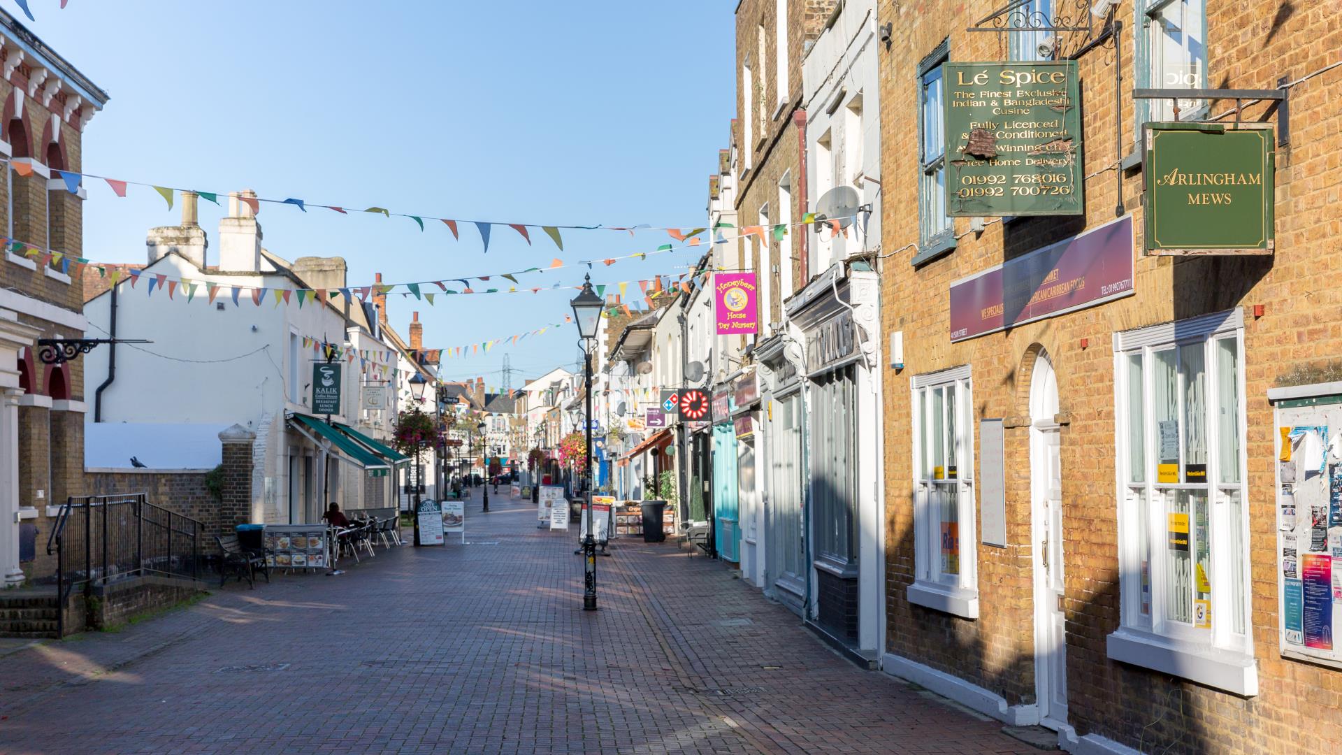 a street with buildings and signs