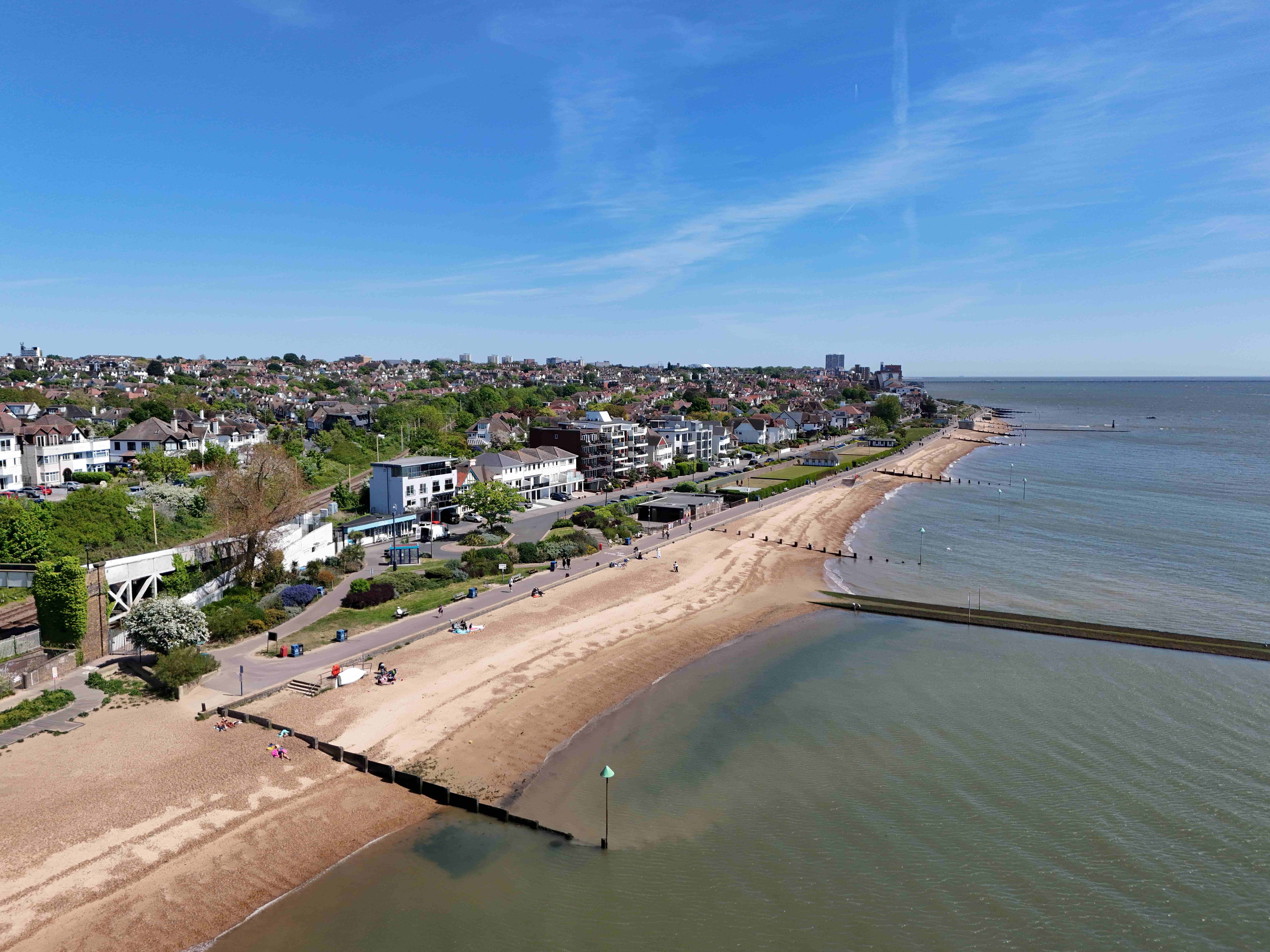 The beach with houses overlooking the sea at Westcliff-on-Sea.