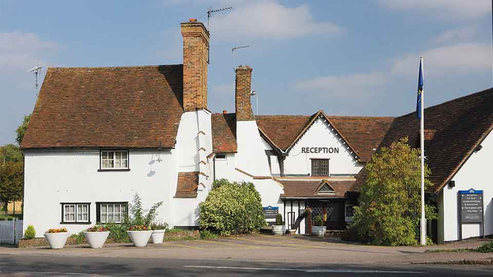 a house with a flagpole