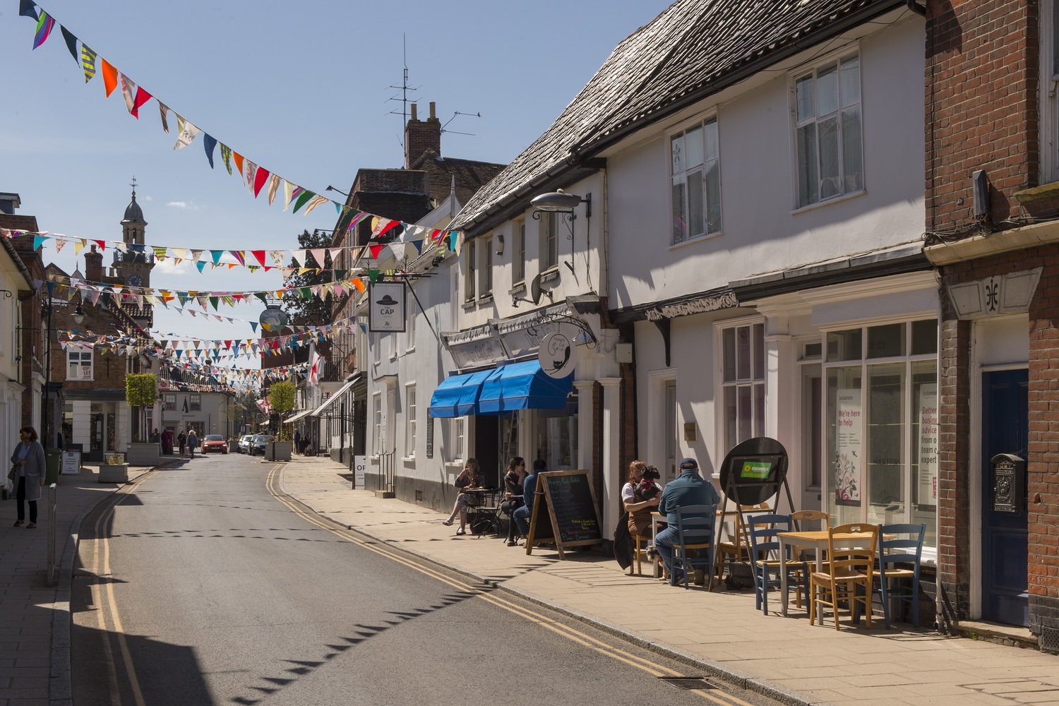 A terraced row of shops and cafés in Harleston, Norfolk