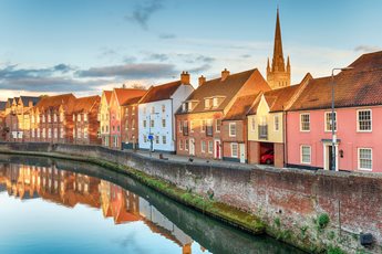 A scenic row of houses along the waterfront in Norwich.’