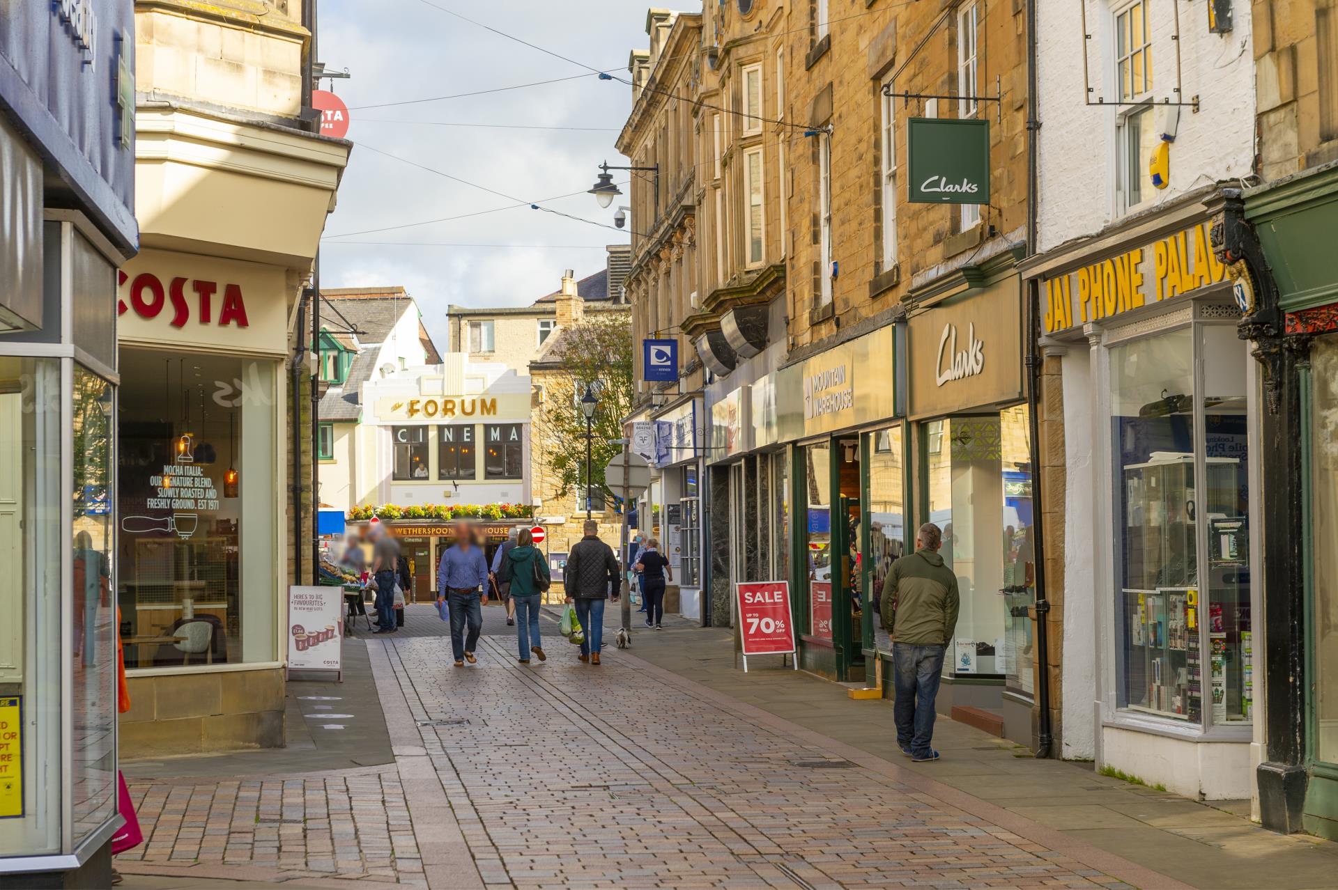 people walking on a street
