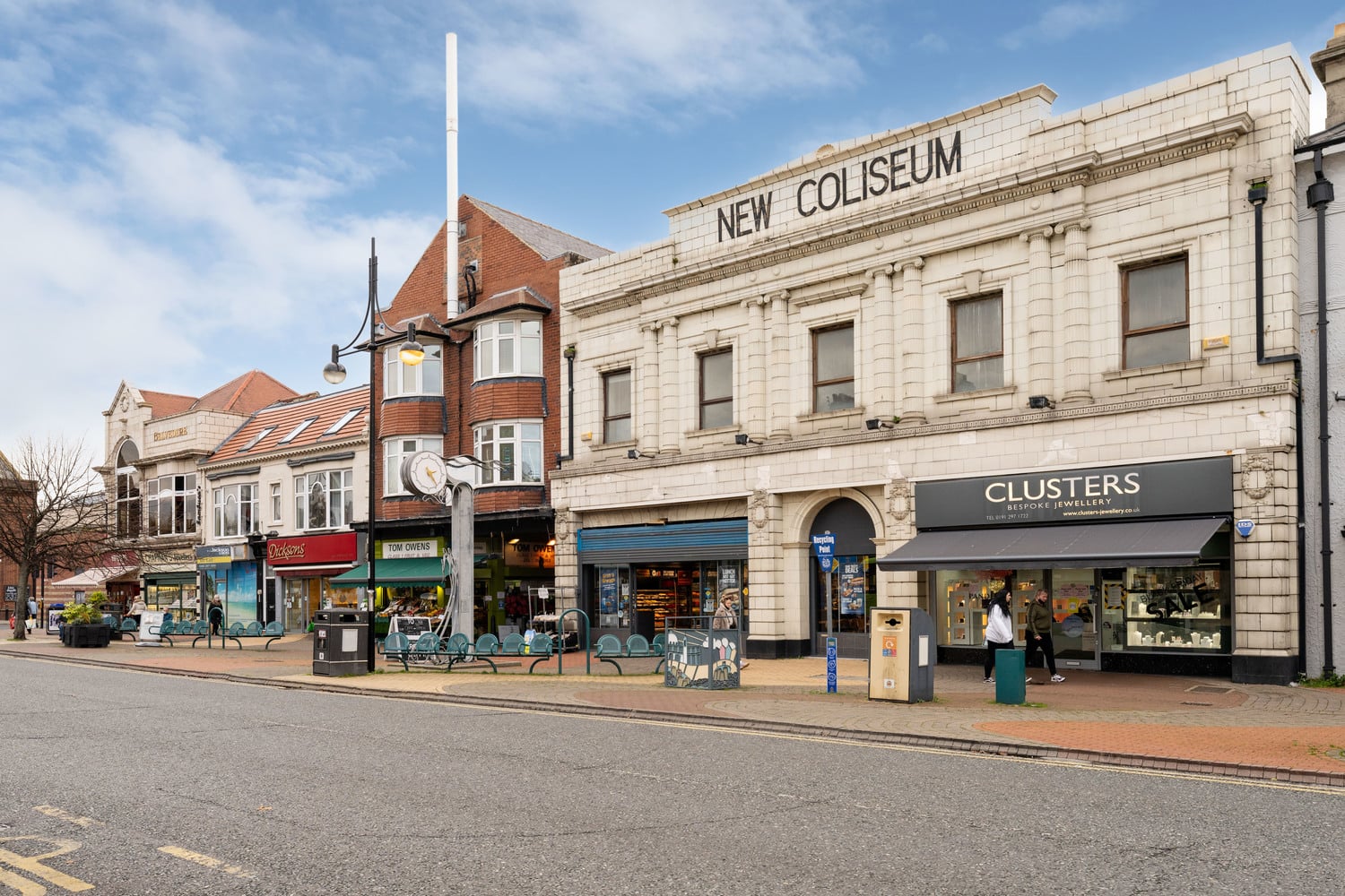 Shops and cafes on a street in Whitley Bay centre.