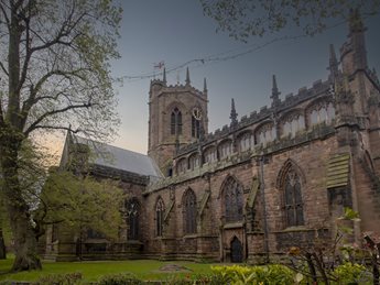 a large stone building with towers