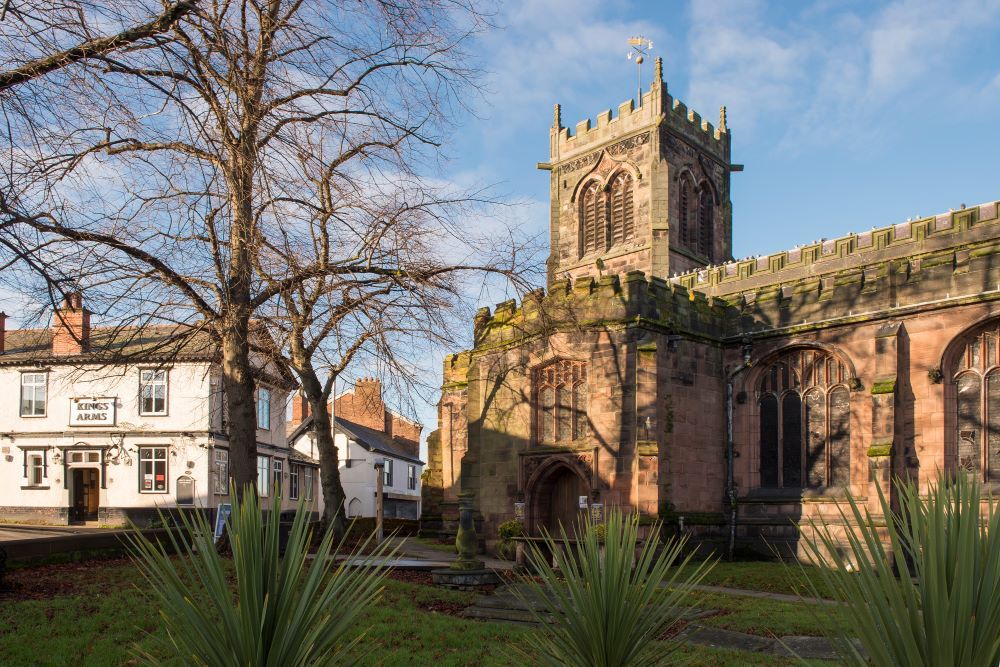 a stone building with a tower