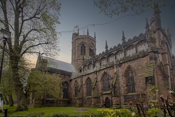 a large stone building with towers