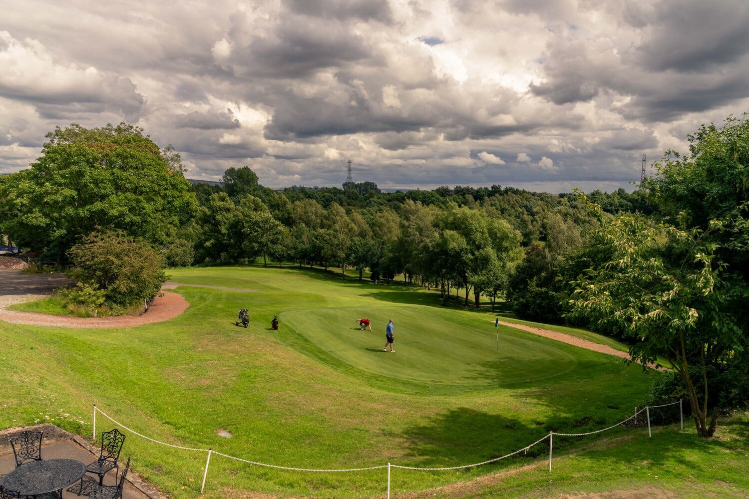 Two people enjoying a round of golf at Brookdale Golf Club.