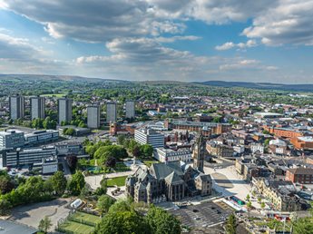 An aerial view of Rochdale with the Town Hall in foreground.