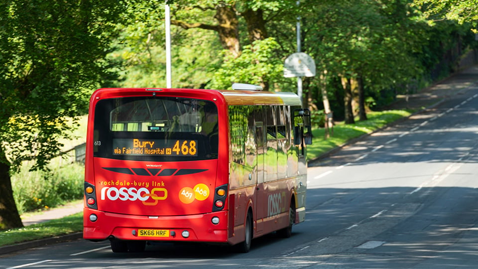 a red bus on the street