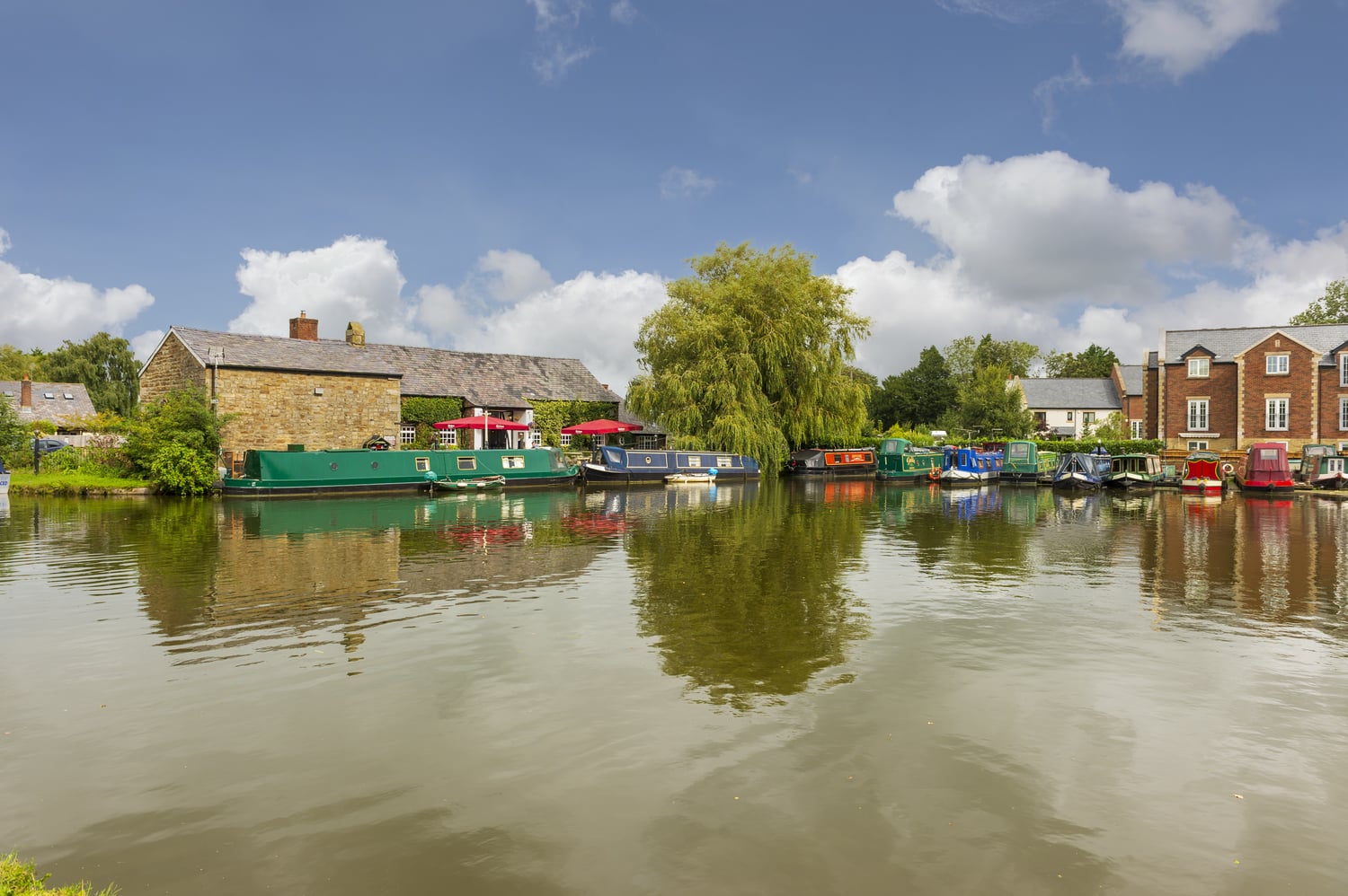 A row of canal boats in a small town in Lancashire.