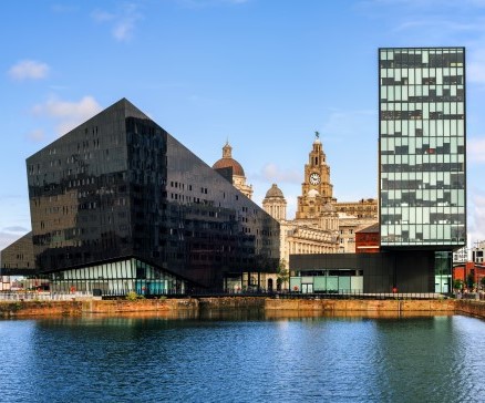 a body of water with buildings along it