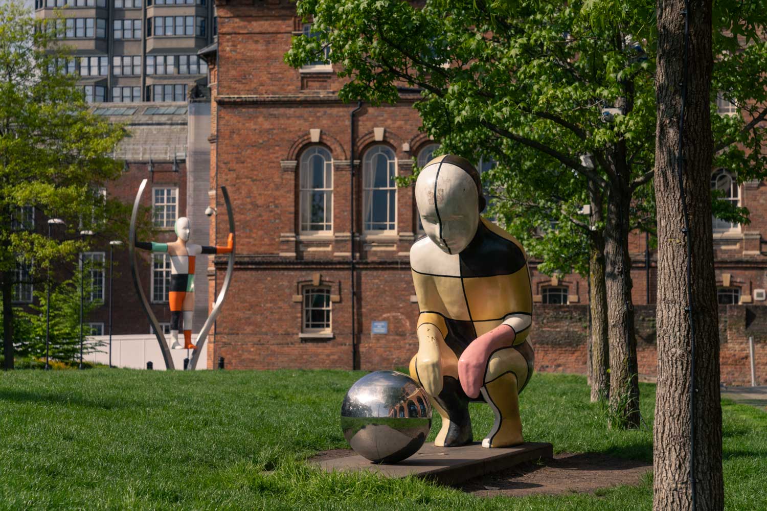 a statue of a person in a park
