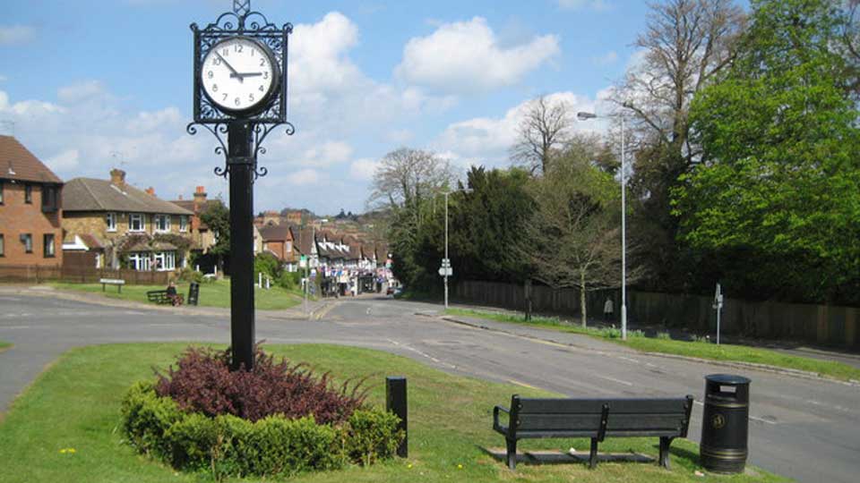 a clock on a pole
