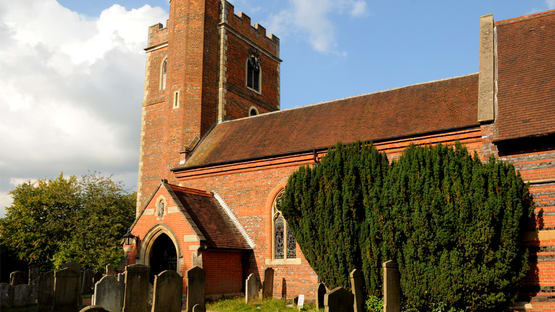 a brick building with a brick tower