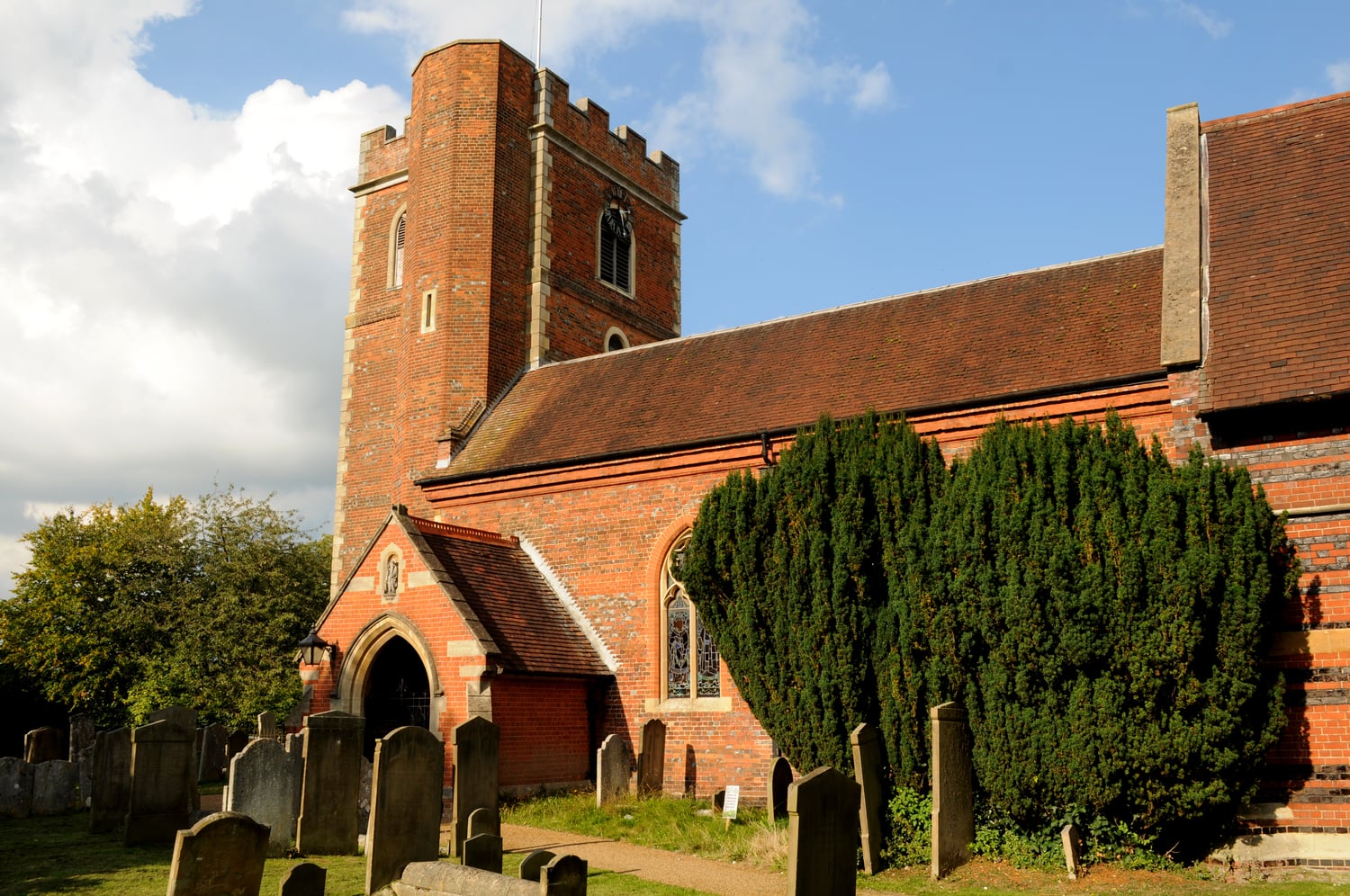 The red brick St Peters church in Chalfont St Peter.