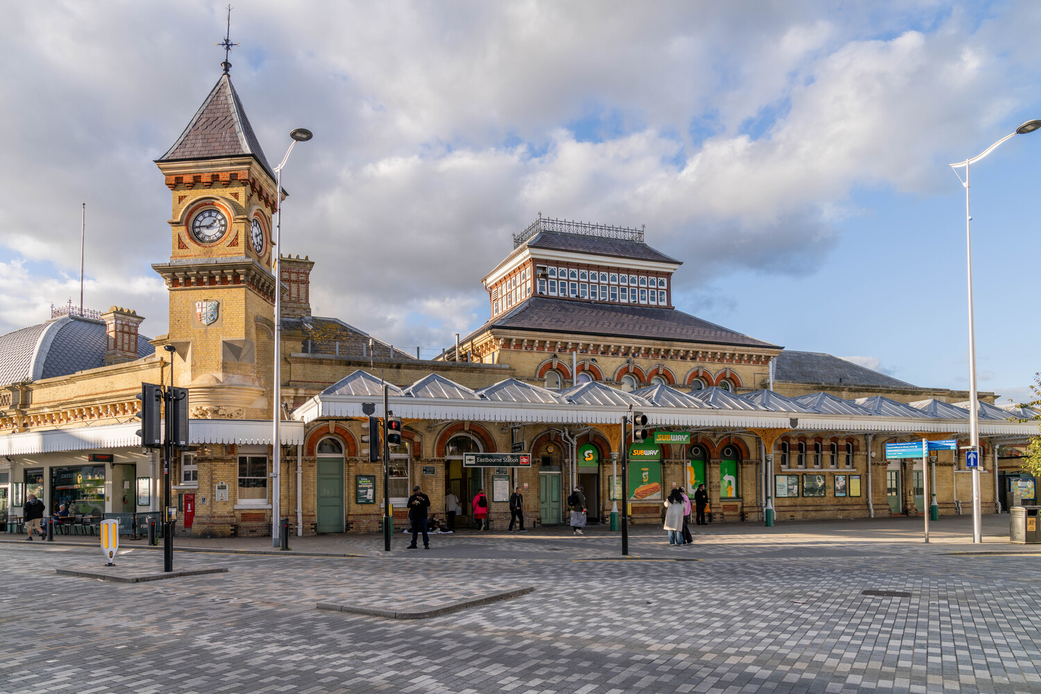 The Eastbourne railway station building that features a clock tower.