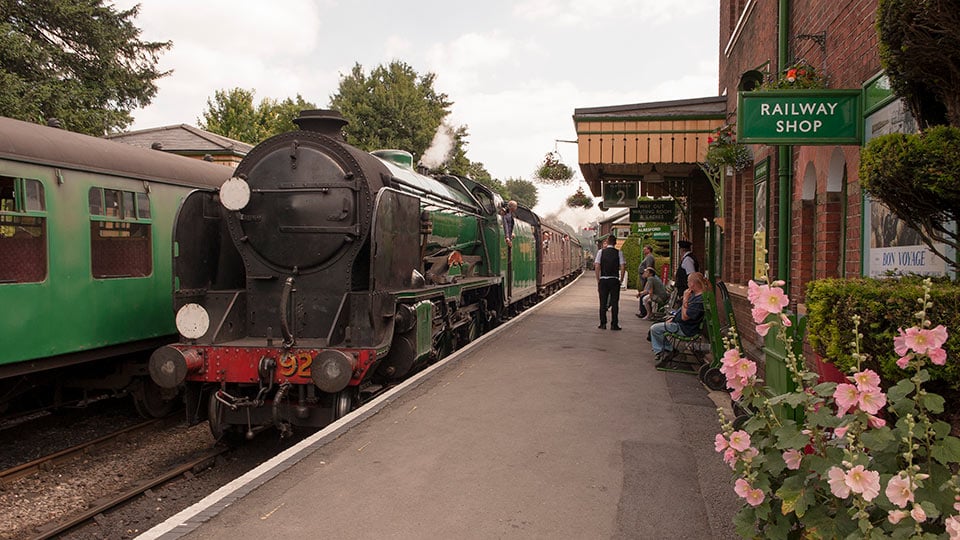 A steam train at Alresford station on the Watercress Line in Hampshire.