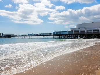 a pier with a building on the side