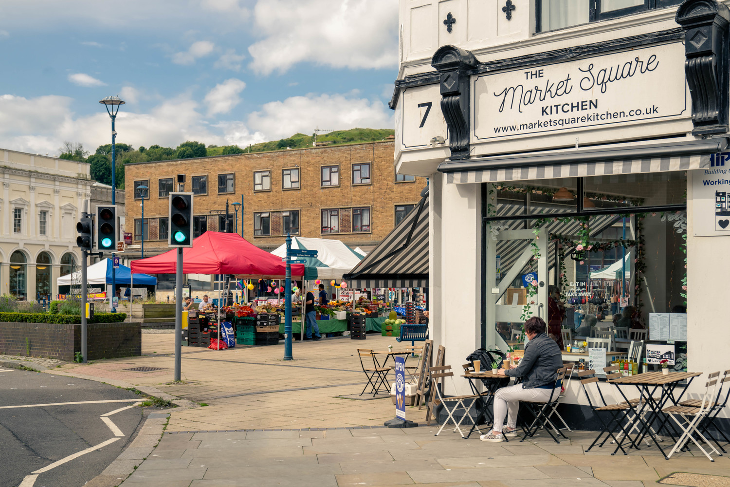 Market stalls and a cafe in the centre of Dover