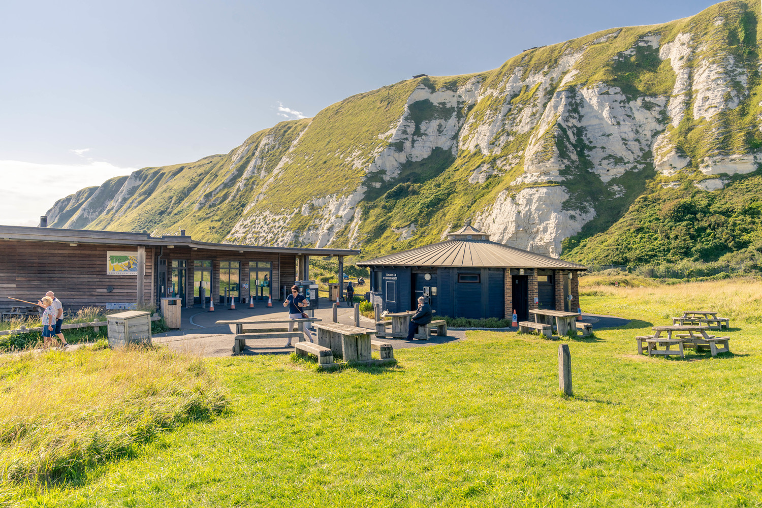 A group of people outside of a building in Samphire Hoe, Dover