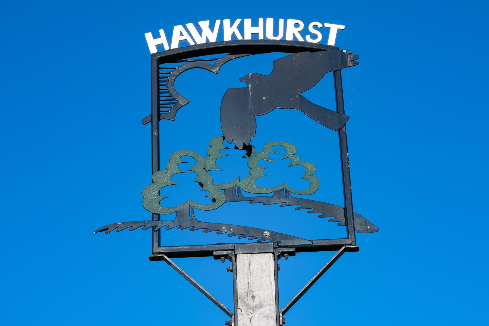 a sign with a bird and a bird on it