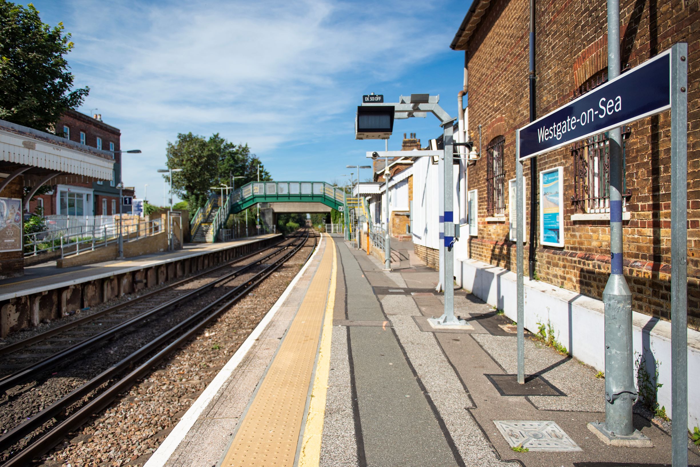 a train station with a train track
