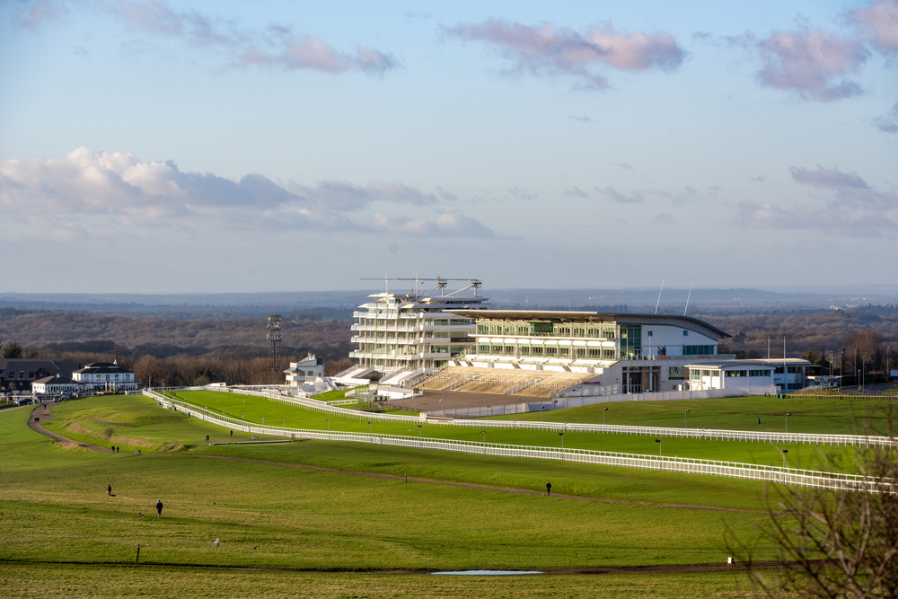 a large building with a large white building in the background