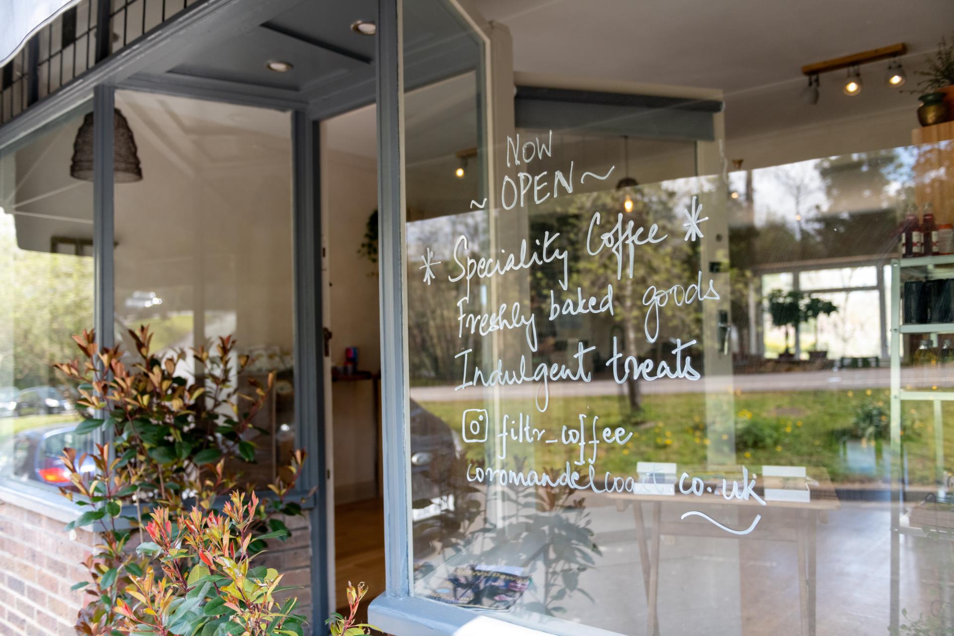 a glass window with writing on it