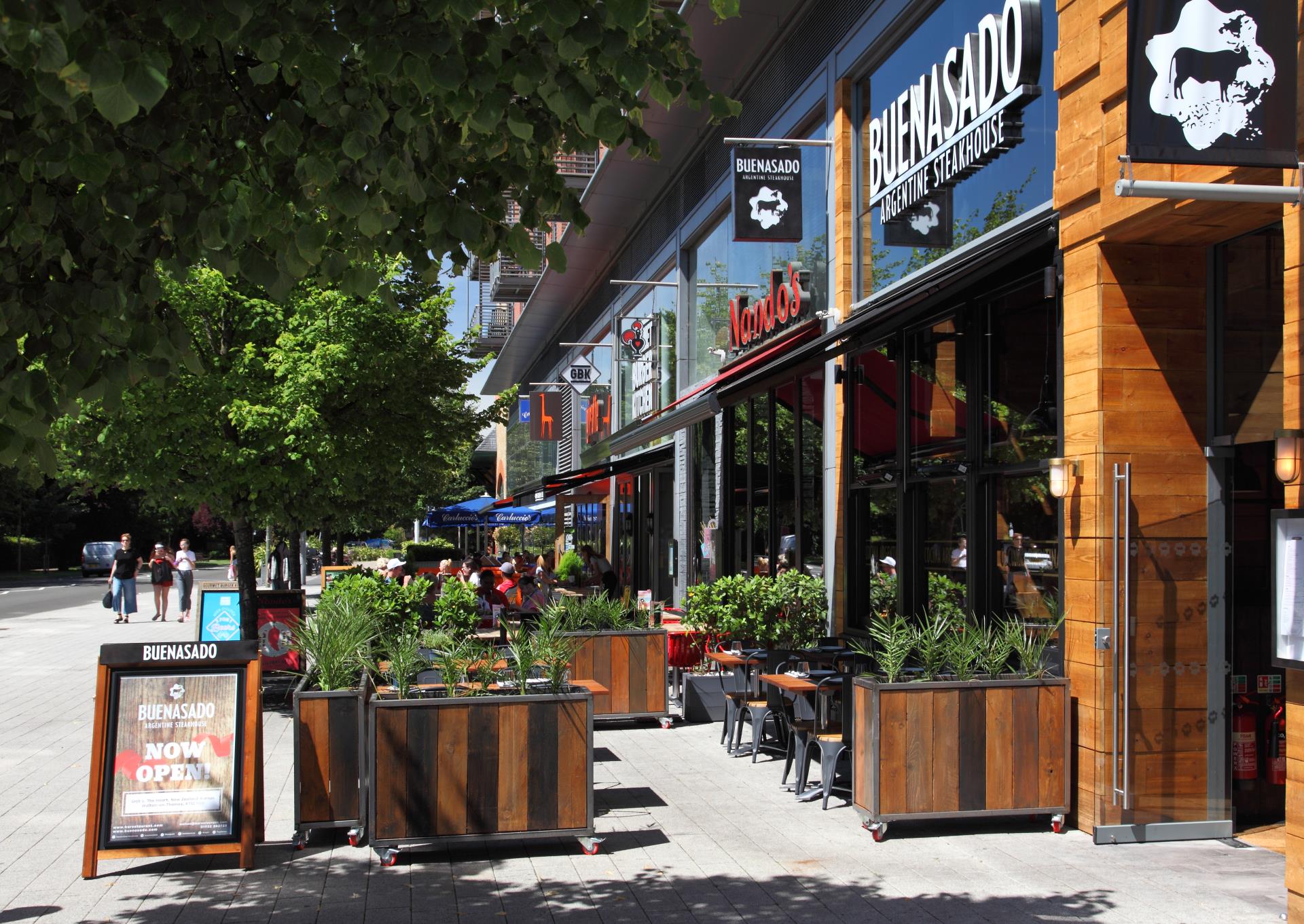 a street with stores and people