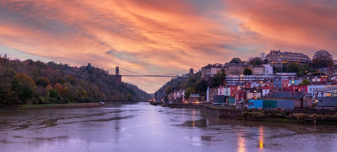 The River Avon at sunset, with Bristol to the east bank and the Clifton Suspension Bridge in the background
