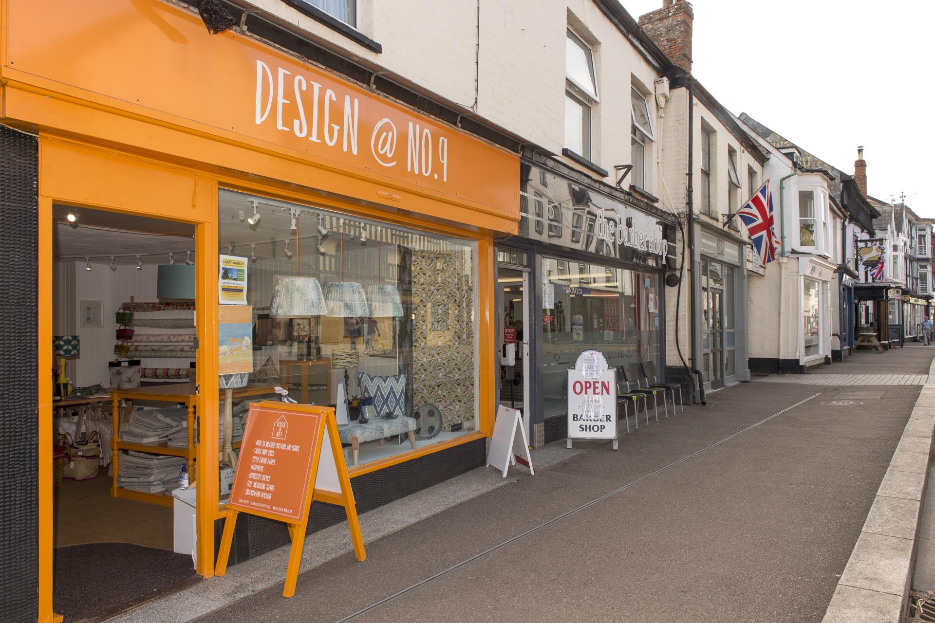 a store front with signs