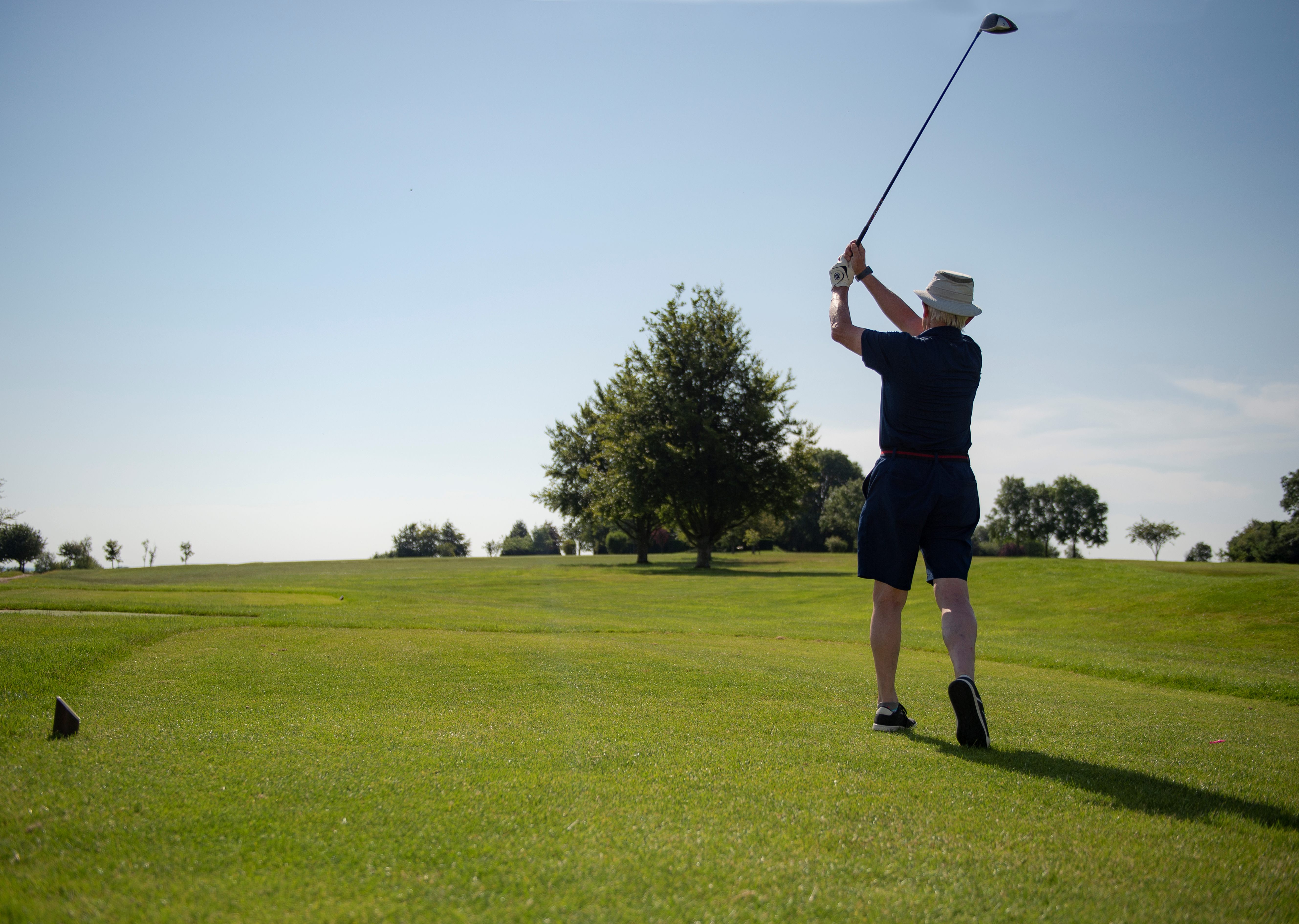 A retiree enjoying the local golf course in Blandford St Mary.