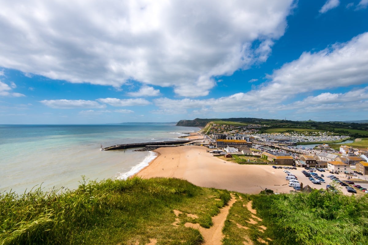 West Bay from cliffs with the town of Bridport inland